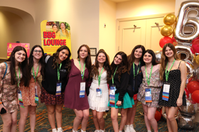Group of people celebrating on stage