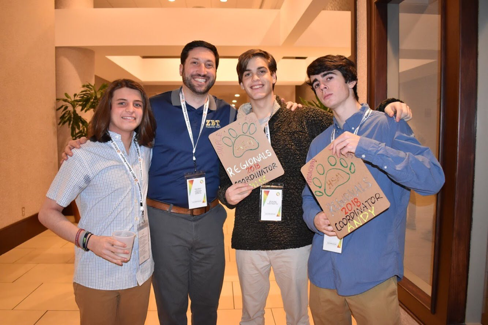 Group of people celebrating on stage