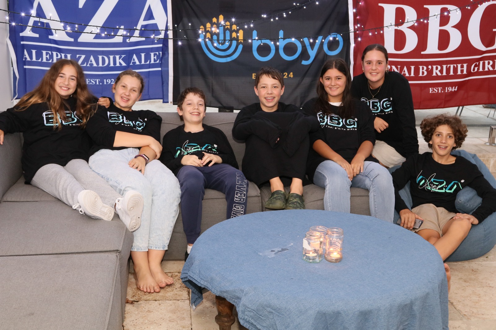 Group of people celebrating on stage