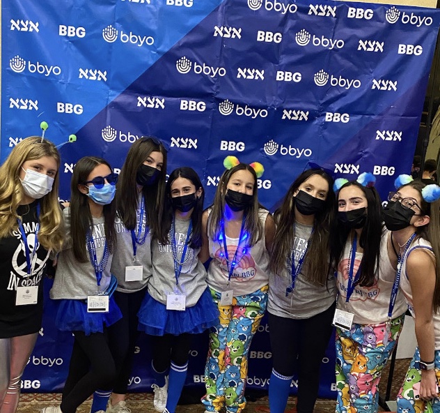 Group of people celebrating on stage