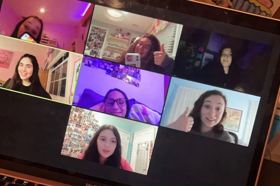 Group of people celebrating on stage