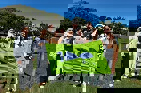 Group of people celebrating on stage