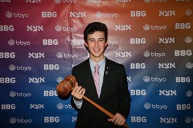 Group of people celebrating on stage