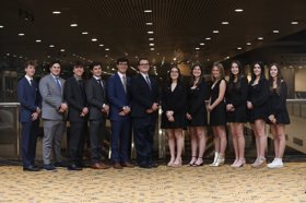 Group of people celebrating on stage