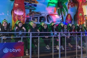 Group of people celebrating on stage