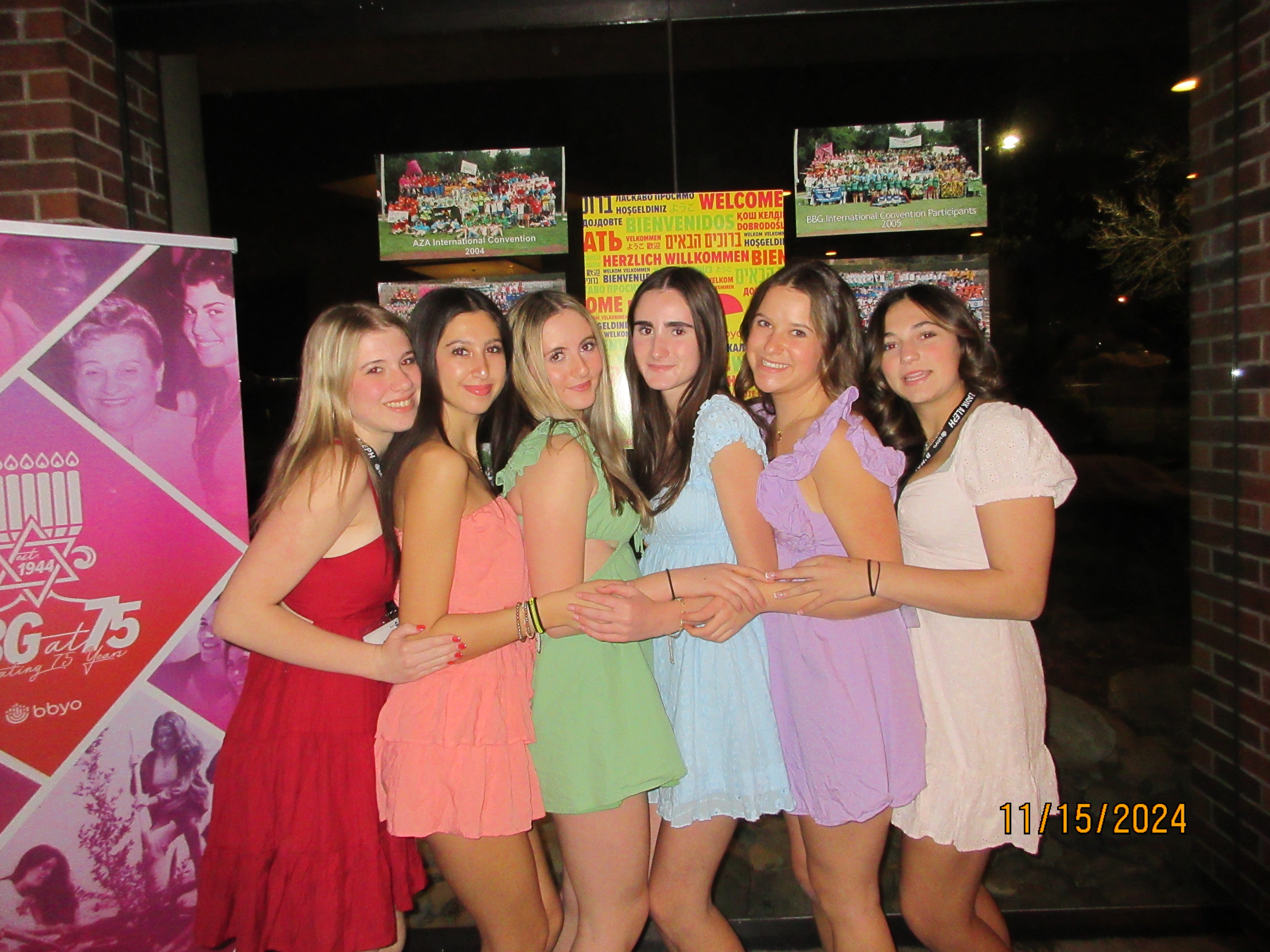 Group of people celebrating on stage