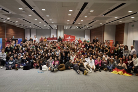 Group of people celebrating on stage