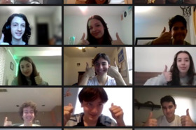 Group of people celebrating on stage