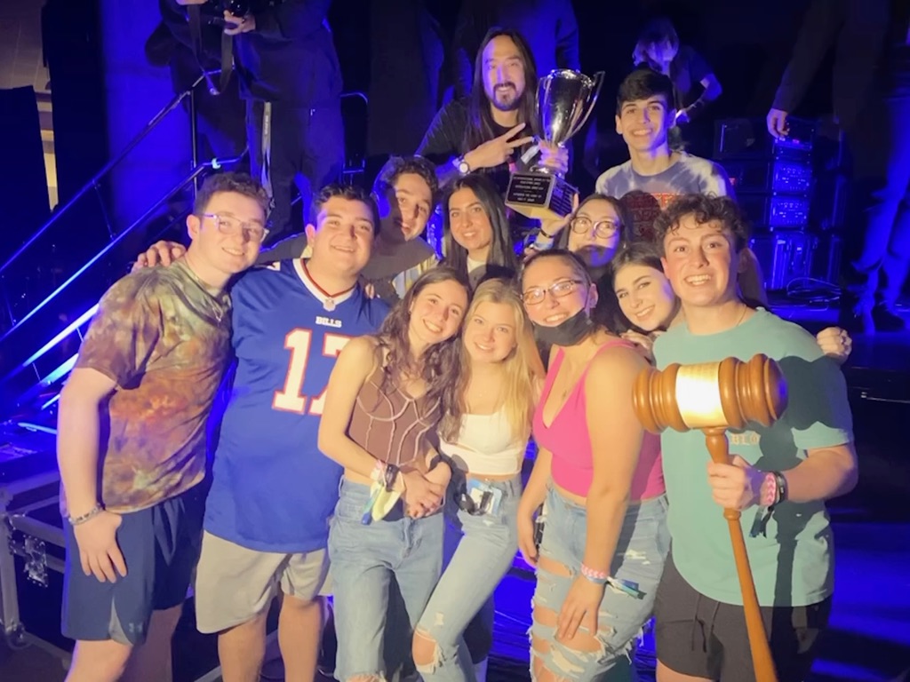 Group of people celebrating on stage