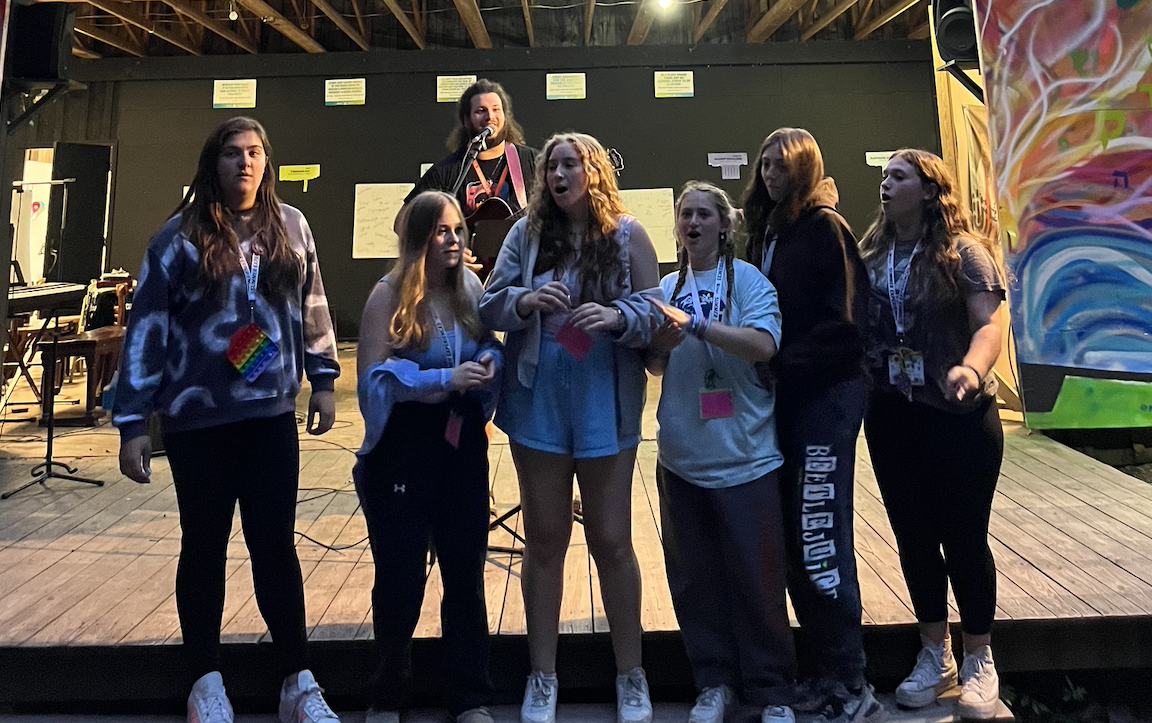 Group of people celebrating on stage