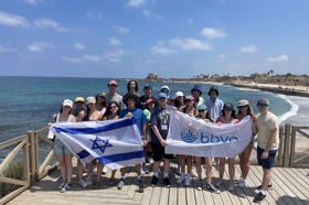 Group of people celebrating on stage