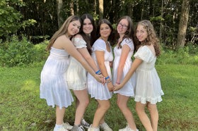 Group of people celebrating on stage